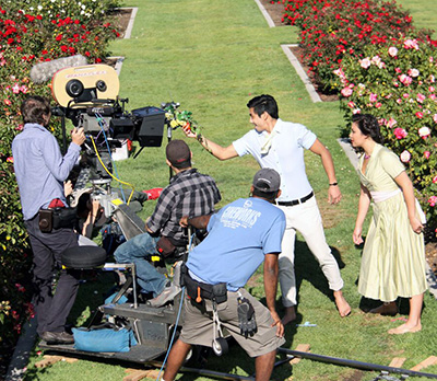 Students film in the Rose Garden.