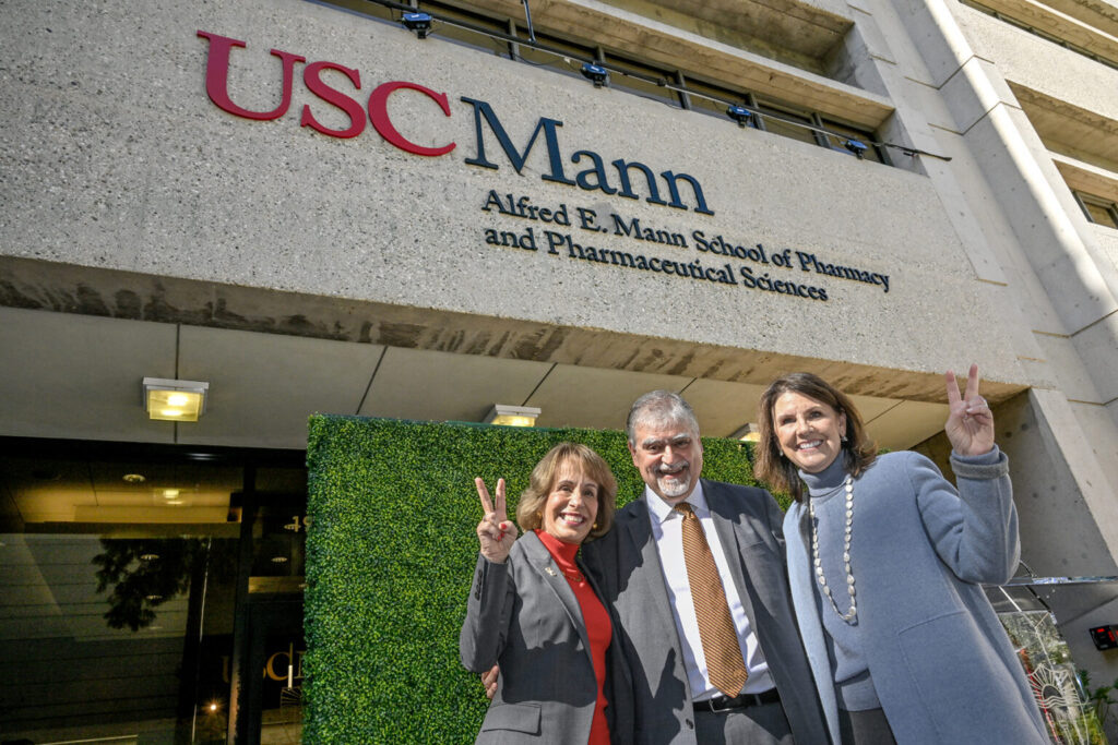 USC President Carol L. Folt, Dean Vassilios Papadopoulos and USC Trustee Chair Suzanne Nora Johnson, from left, celebrated the naming of the USC Alfred E. Mann School of Pharmacy and Pharmaceutical Sciences.