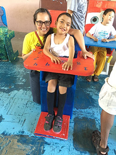 OT student with child in the Phillippines
