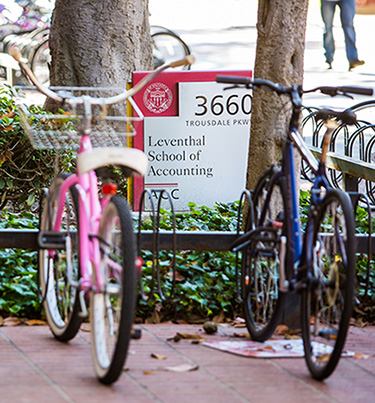 Student bicycles in front of the Accounting building